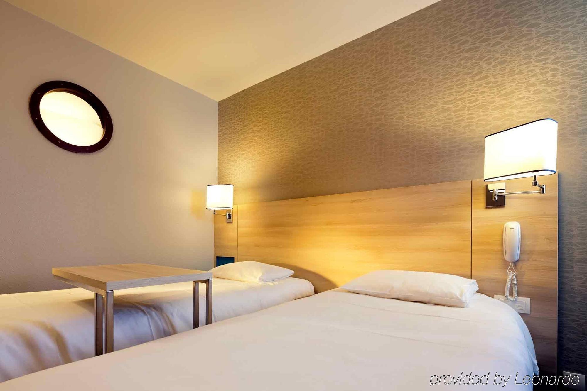 Hotel Ibis Styles Ouistreham Habitación foto